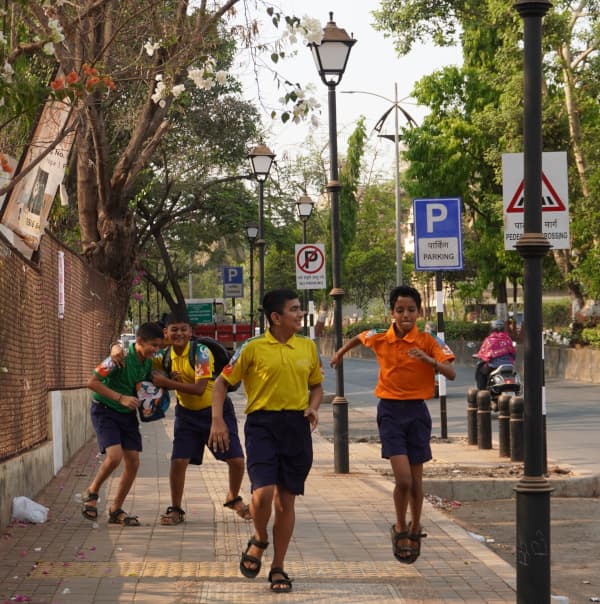 Residents and children walking on redesigned street in Pimpri-Chinchwad